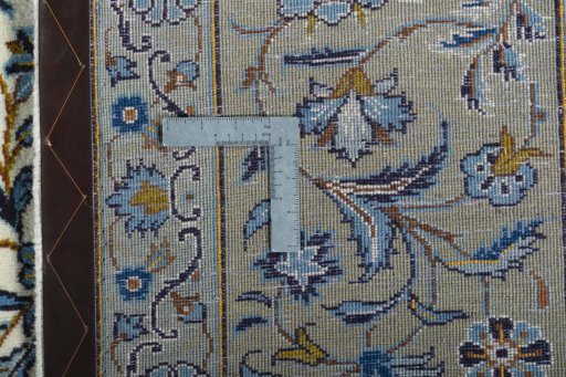 Central medallion detail of 2000s Kashan rug from Iran / Persia