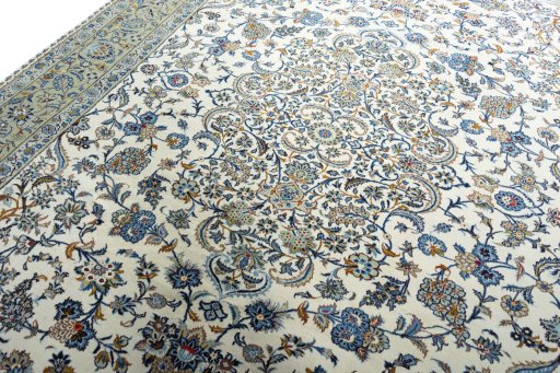 Backside of handmade 2000s Kashan rug showing knot structure and weave density
