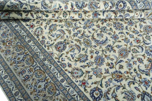 Close-up detail of 2000s Kashan rug from Iran / Persia showing Wool weave