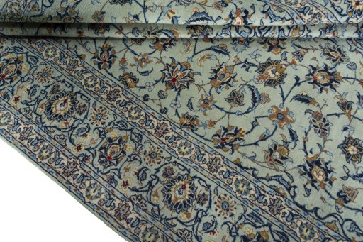 Close-up detail of 2000s Kashan rug from Iran / Persia showing Wool weave