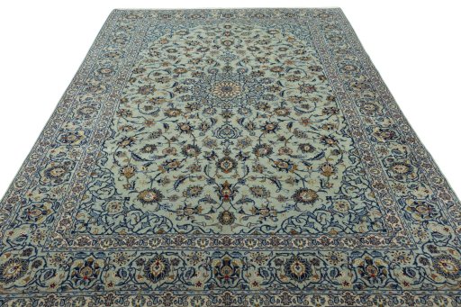Surface texture of 2000s Kashan rug with natural Wool and intricate pattern