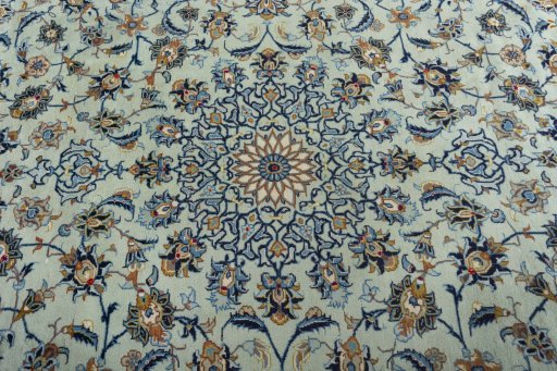 Central medallion detail of 2000s Kashan rug from Iran / Persia