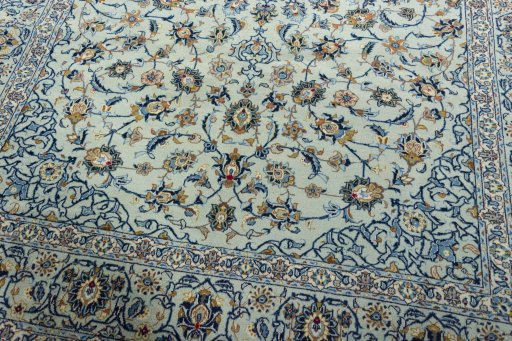 Close-up detail of 2000s Kashan rug from Iran / Persia showing Wool weave