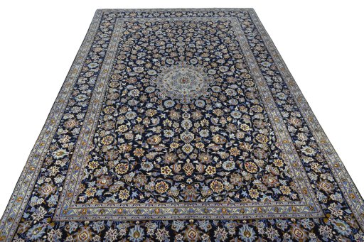 Surface texture of 2000s Kashan rug with natural Wool and intricate pattern