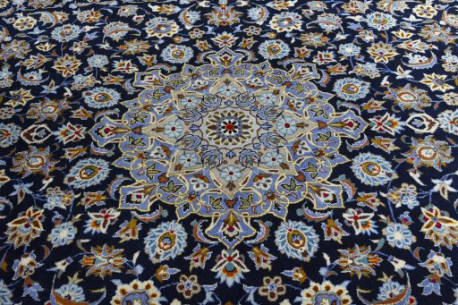 Central medallion detail of 2000s Kashan rug from Iran / Persia