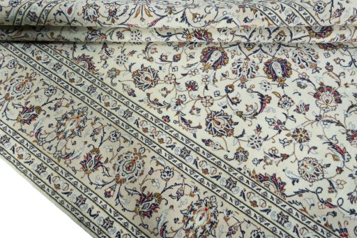 Close-up detail of 2000s Kashan rug from Iran / Persia showing Wool weave