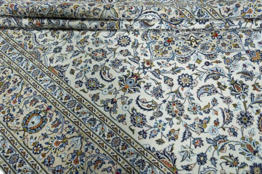 Close-up detail of 2000s Kashan rug from Iran / Persia showing Wool weave