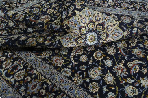 Surface texture of 1970s Kashan rug with natural Wool and intricate pattern