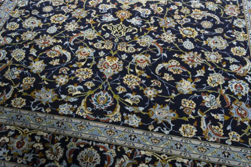 Close-up detail of 1970s Kashan rug from Iran / Persia showing Wool weave