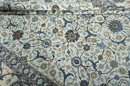 Close-up detail of 2000s Kashan rug from Iran / Persia showing Wool weave