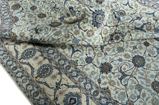 Surface texture of 2000s Kashan rug with natural Wool and intricate pattern