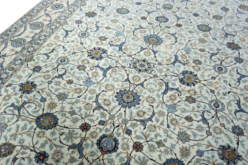 Backside of handmade 2000s Kashan rug showing knot structure and weave density