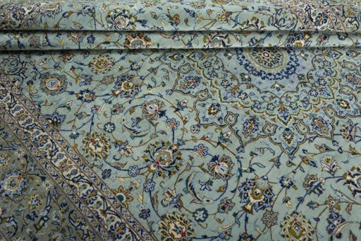 Close-up detail of 2000s Kashan rug from Iran / Persia showing Wool weave