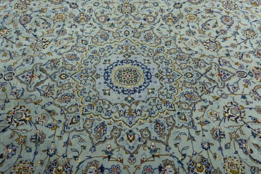 Central medallion detail of 2000s Kashan rug from Iran / Persia