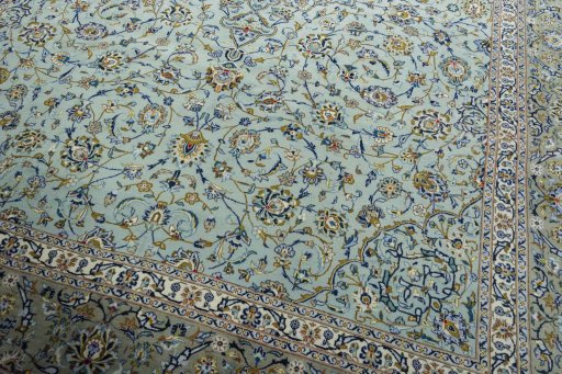 Close-up detail of 2000s Kashan rug from Iran / Persia showing Wool weave