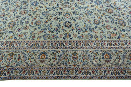 Corner detail of 1970s Kashan rug showing border pattern and Wool pile