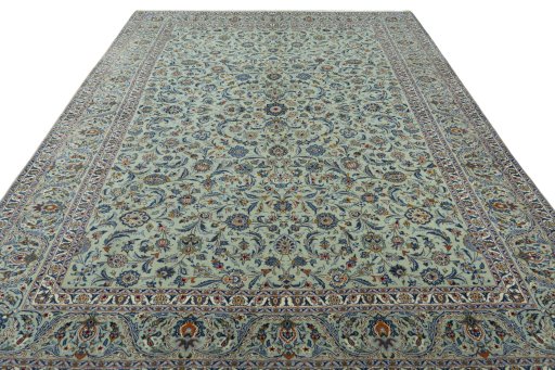 Surface texture of 1970s Kashan rug with natural Wool and intricate pattern