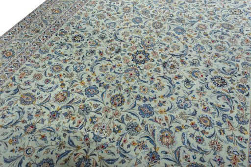 Backside of handmade 1970s Kashan rug showing knot structure and weave density