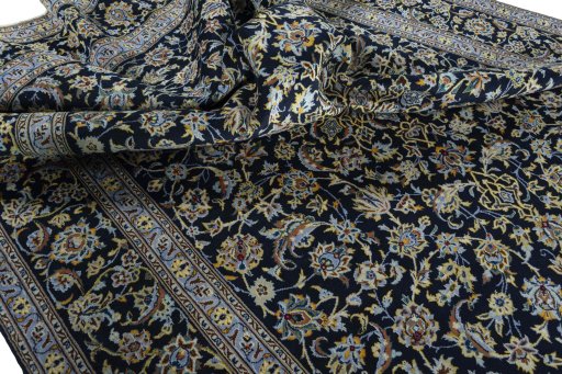 Surface texture of New Kashan rug with natural Wool and intricate pattern