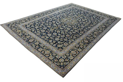 Corner detail of New Kashan rug showing border pattern and Wool pile