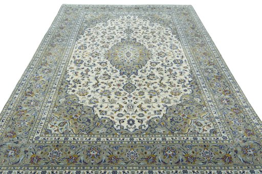 Surface texture of 2000s Kashan rug with natural Wool and intricate pattern