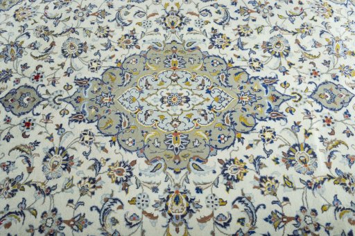 Central medallion detail of 2000s Kashan rug from Iran / Persia