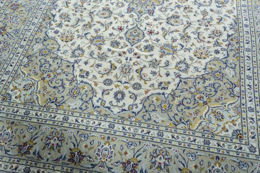 Close-up detail of 2000s Kashan rug from Iran / Persia showing Wool weave