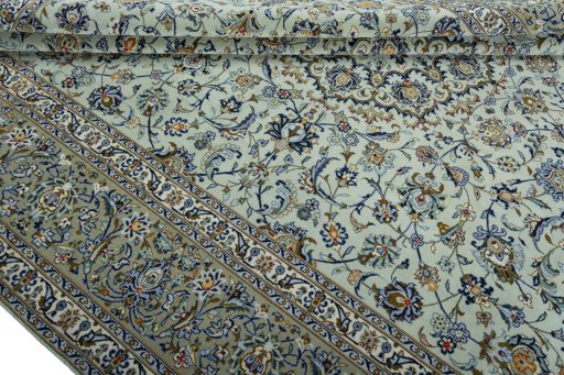 Close-up detail of 2000s Kashan rug from Iran / Persia showing Wool weave