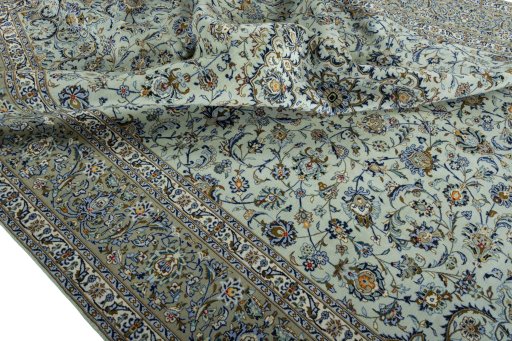 Surface texture of 2000s Kashan rug with natural Wool and intricate pattern