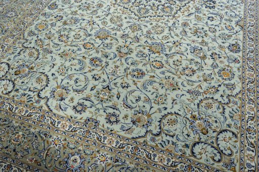Close-up detail of 2000s Kashan rug from Iran / Persia showing Wool weave