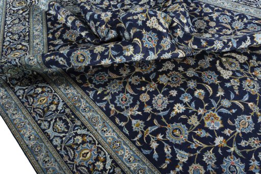 Surface texture of 2000s Kashan rug with natural Wool and intricate pattern