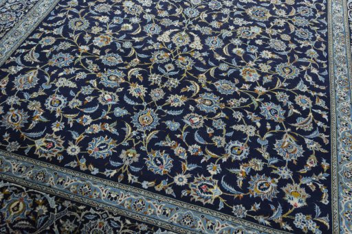 Close-up detail of 2000s Kashan rug from Iran / Persia showing Wool weave