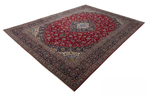 Corner detail of 2000s Kashan rug showing border pattern and Wool pile