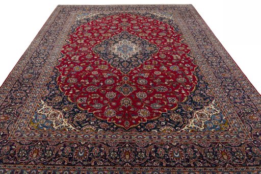 Surface texture of 2000s Kashan rug with natural Wool and intricate pattern