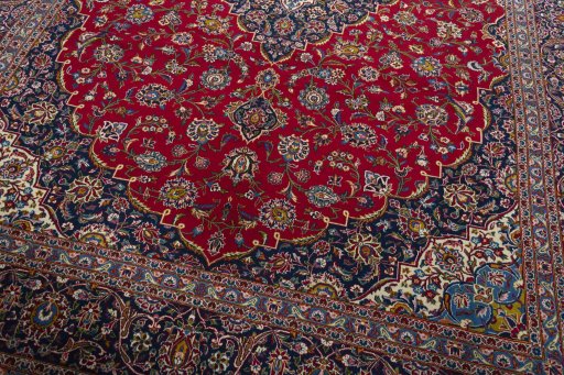 Close-up detail of 2000s Kashan rug from Iran / Persia showing Wool weave
