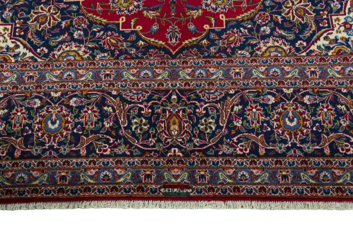 Full view of 2000s Kashan rug from Iran / Persia, 423 × 298 cm in Red tones