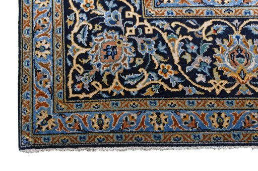Close-up detail of 2000s Kashan rug from Iran / Persia showing Wool weave