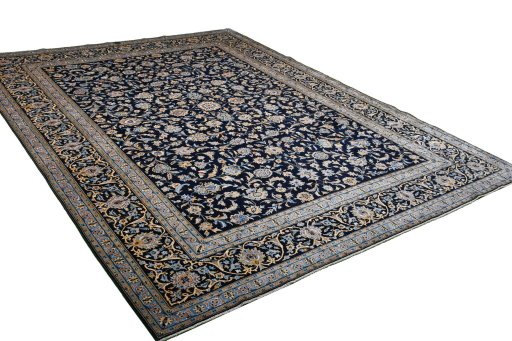 Corner detail of 2000s Kashan rug showing border pattern and Wool pile