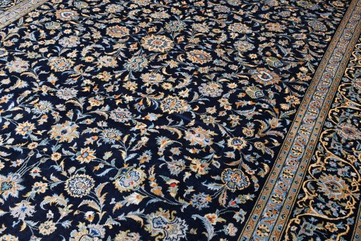Central medallion detail of 2000s Kashan rug from Iran / Persia