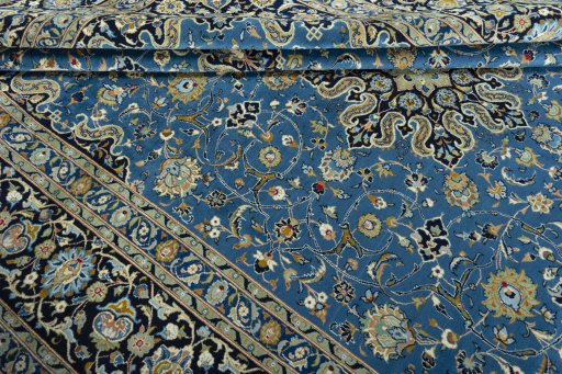 Close-up detail of 2000s Kashan rug from Iran / Persia showing Wool weave