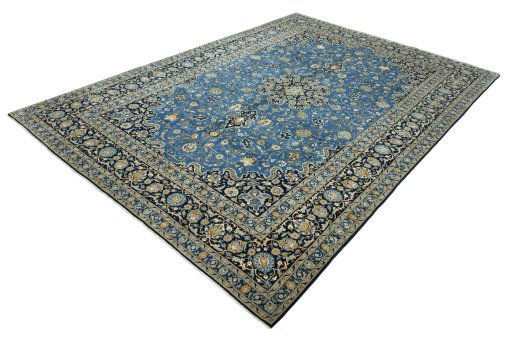 Corner detail of 2000s Kashan rug showing border pattern and Wool pile