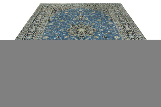 Surface texture of 2000s Kashan rug with natural Wool and intricate pattern