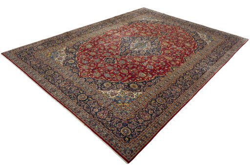 Corner detail of 2000s Kashan rug showing border pattern and Wool pile