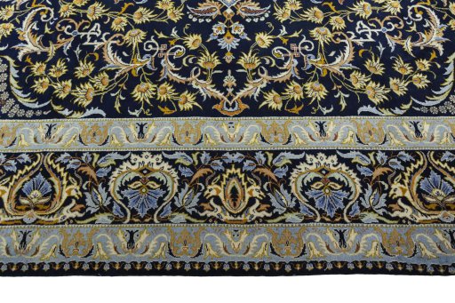 Corner detail of 2000s Kashan rug showing border pattern and Wool pile