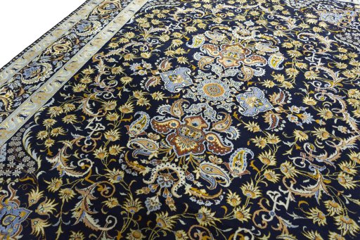 Backside of handmade 2000s Kashan rug showing knot structure and weave density