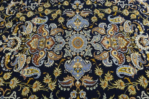 Central medallion detail of 2000s Kashan rug from Iran / Persia