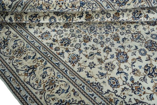 Close-up detail of 2000s Kashan rug from Iran / Persia showing Wool weave