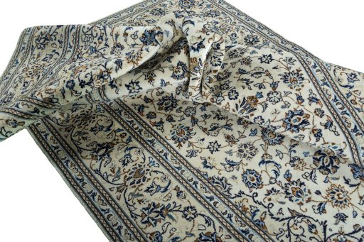 Surface texture of 2000s Kashan rug with natural Wool and intricate pattern