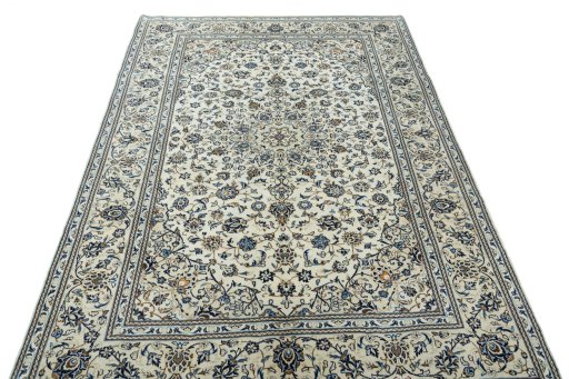 Surface texture of 2000s Kashan rug with natural Wool and intricate pattern