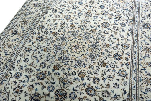 Backside of handmade 2000s Kashan rug showing knot structure and weave density